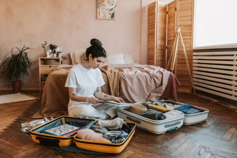 The Suitcase on the Floor: What Refusing to Unpack Tells Us About the American Idea of Home
